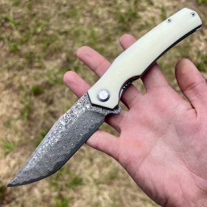 Couteau pliant massif acier damas #328